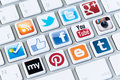 social-media-buttons-logotype-collection-well-known-network-brand-s-placed-modern-computer-keyboard-31471875